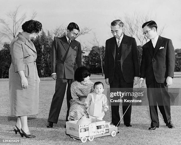 Members of the Japanese Imperial Family are photographed for their New Year's Day picture in the grounds of the Imperial Palace in Tokyo, 1st January...