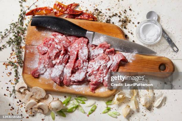 velveting an inside round steak - baking soda stock pictures, royalty-free photos & images