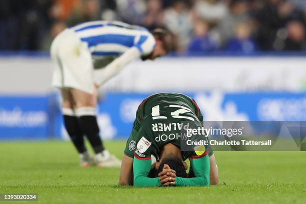 Romal Palmer of Barnsley reacts following a loss resulting in relegation in the Sky Bet Championship match between Huddersfield Town and Barnsley at...