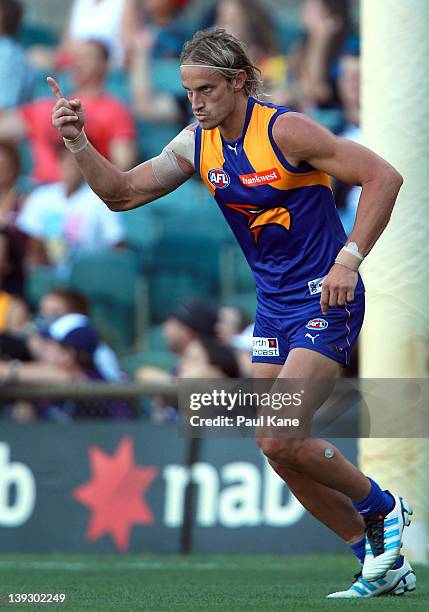 Mark Nicoski of the Eagles celebrates a goal during the NAB Cup AFL match between the West Coast Eagles and the Essendon Bombers at Patersons Stadium...