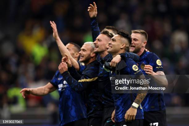 Internazionale players celebrate following the final whistle of the Coppa Italia Semi Final 2nd Leg match between FC Internazionale v AC Milan at...