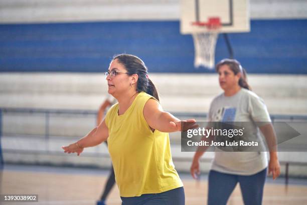 view of basketball field, mothers playing basketball - basketball league stock pictures, royalty-free photos & images