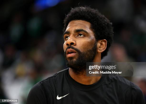 Kyrie Irving of the Brooklyn Nets looks on before Round 1 Game 1 of the 2022 NBA Eastern Conference Playoffs at TD Garden on April 17, 2022 in...