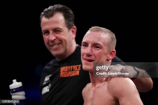 Paul Butler celebrates victory in with their trainer after the WBO Interim World Bantamweight Title fight between Paul Butler and Jonas Sultan at M&S...