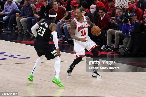 DeMar DeRozan of the Chicago Bulls is defended by Wesley Matthews of the Milwaukee Bucks during the first quarter of Game Three of the Eastern...