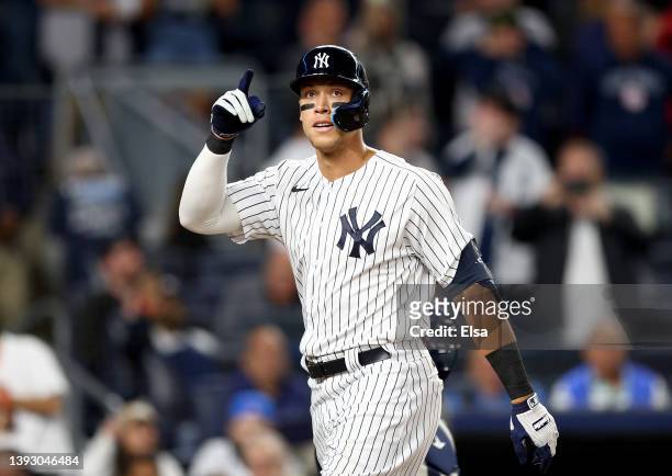 Aaron Judge of the New York Yankees celebrates his solo home run in the fifth inning against the Cleveland Guardians at Yankee Stadium on April 22,...