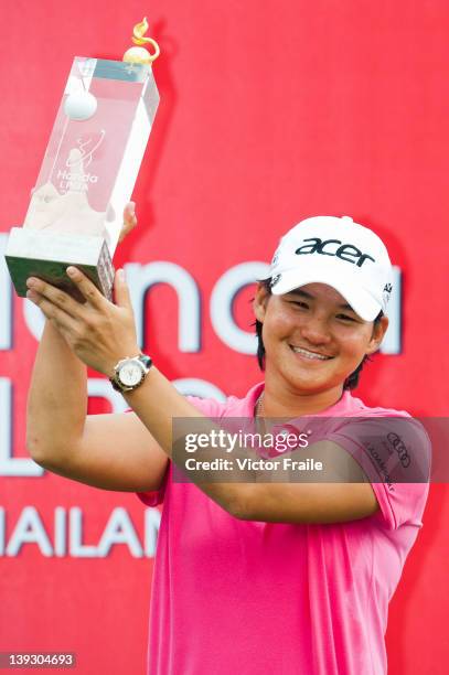 Yani Tseng of Taiwan celebrates with the trophy after winning the LPGA Thailand at Siam Country Club on February 19, 2012 in Chon Buri, Thailand.