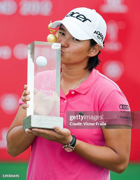 Yani Tseng of Taiwan poses with the trophy after winning the LPGA Thailand at Siam Country Club on February 19, 2012 in Chon Buri, Thailand.