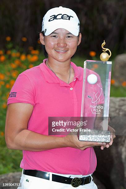 Yani Tseng of Taiwan poses with the trophy after winning the LPGA Thailand at Siam Country Club on February 19, 2012 in Chon Buri, Thailand.