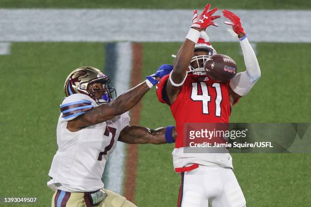 Lance Lenoir Jr. #7 of Michigan Panthers breaks up a catch by De'Vante Bausby of New Jersey Generals in the second quarter of the game at Protective...