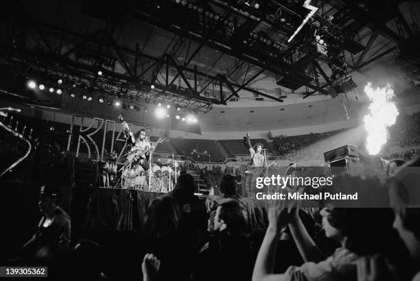 American heavy metal group Kiss performing at the Nassau Coliseum, Uniondale, New York, 21st February 1977. Left to right: Gene Simmons, Paul Stanley...