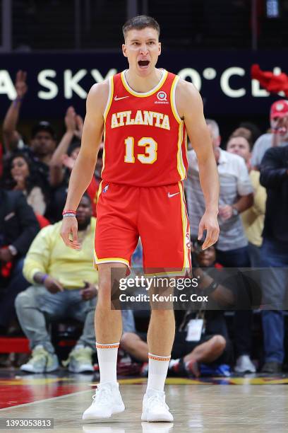 Bogdan Bogdanovic of the Atlanta Hawks celebrates against the Miami Heat during second half in Game Three of the Eastern Conference First Round at...