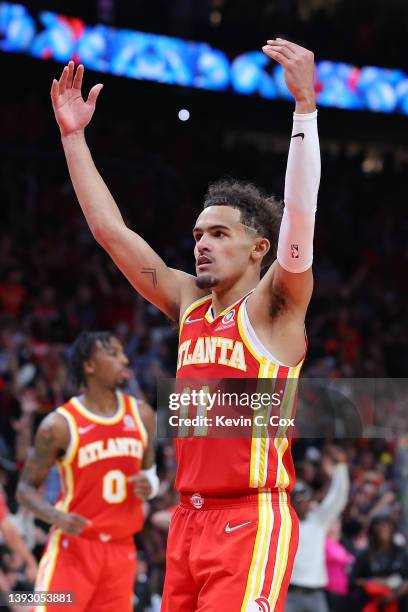 Trae Young of the Atlanta Hawks celebrates after making a floater with 5.5 seconds remaining during the fourth quarter against the Miami Heat in Game...