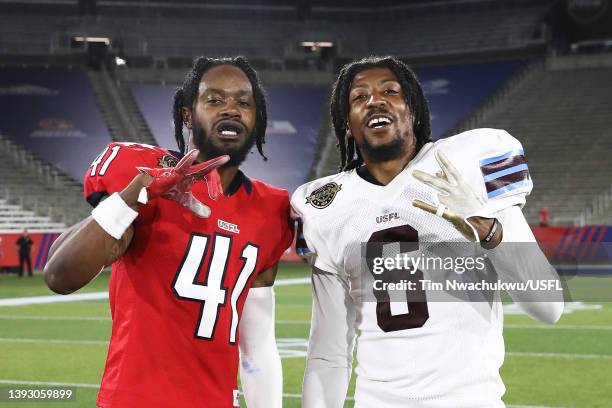 De'Vante Bausby of New Jersey Generals and Orion Stewart of Michigan Panthers pose for a photo after the game where the New Jersey Generals defeated...