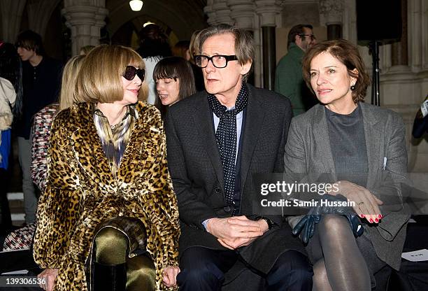 Anna Wintour, Bill Nighy and Diana Quick attend the Nicole Farhi show during London Fashion Week Autumn/Winter 2012 at the Royal Courts of Justice on...