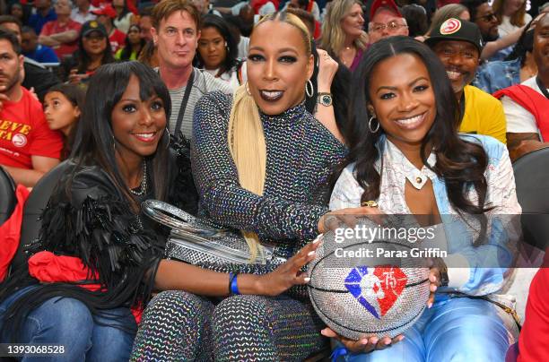 Kimberly Evans Paige, Kimberly Blackwell, and Kandi Burruss attend Game Three of the Eastern Conference First Round between the Miami Heat and the...