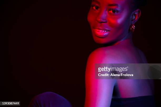 portrait of young beautiful afro woman - strip lights stock pictures, royalty-free photos & images