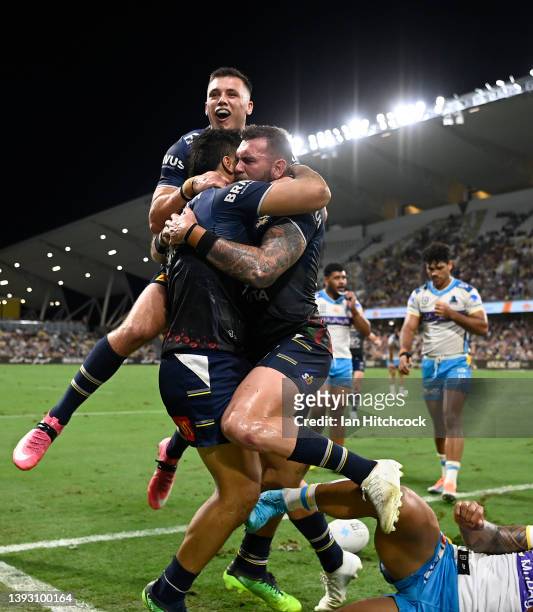 Jeremiah Nanai of the Cowboys celebrates after scoring a try during the round seven NRL match between the North Queensland Cowboys and the Gold Coast...