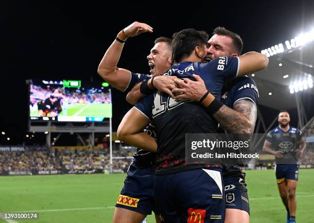 Jeremiah Nanai of the Cowboys celebrates after scoring a try during the round seven NRL match between the North Queensland Cowboys and the Gold Coast...