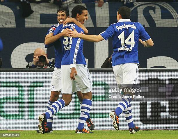 Raul of Schalke celebrates with his team mates after scoring his team's first goal during the Bundesliga match between FC Schalke 04 and VfL...