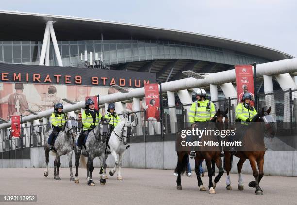 Police horses are seen outside the stadium prior to the Premier League match between Arsenal and Manchester United at Emirates Stadium on April 23,...