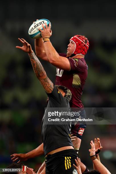 Harry Wilson of the Reds competes in the lineout during the round 10 Super Rugby Pacific match between the Hurricanes and the Queensland Reds at AAMI...