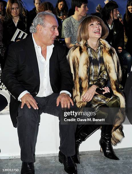 Sir Philip Green and Anna Wintour sit in the front row at the Unique Autumn/Winter 2012 show during London Fashion Week at TopShop Venue on February...