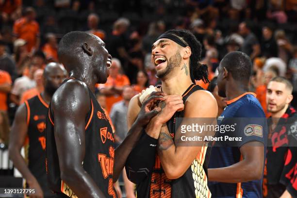 Bul Kuol and Keanu Pinder of the Taipans celebrate victory during the round 21 NBL match between Cairns Taipans and Brisbane Bullets at Cairns...