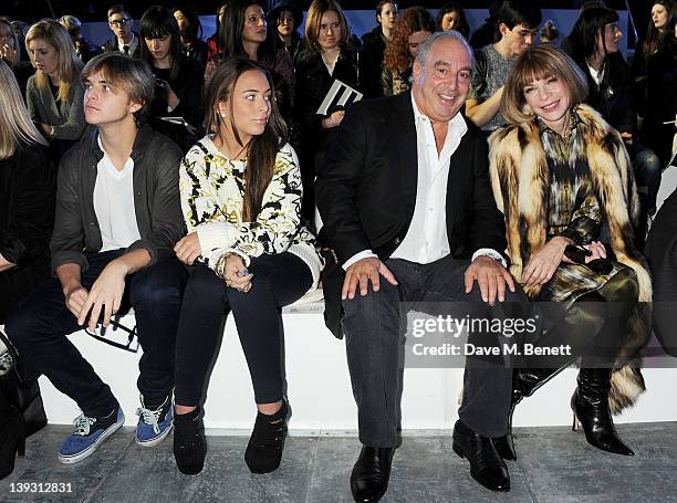 Brandon Green, Chloe Green, Sir Philip Green and Anna Wintour sit in the front row at the Unique Autumn/Winter 2012 show during London Fashion Week...