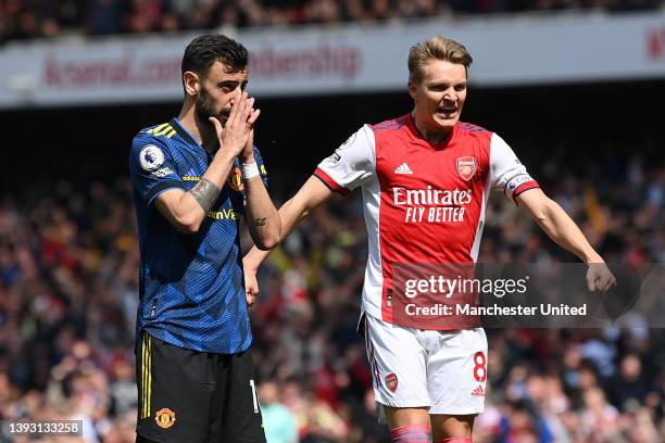 Bruno Fernandes of Manchester United reacts to missing a penalty during the Premier League match between Arsenal and Manchester United at Emirates...