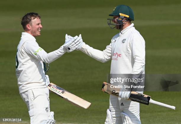 Notts batsman Ben Slater is congratulated by Jame Pattinson after Slater had reached his 200 during day three of the LV= Insurance County...