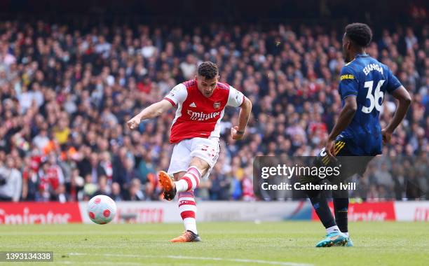 Granit Xhaka of Arsenal scores their side's third goal during the Premier League match between Arsenal and Manchester United at Emirates Stadium on...