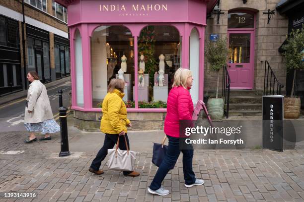 Visitors walk past independent retail shops in the Montpellier Quarter of Harrogate on April 23, 2022 in Harrogate, England. A recent report from the...