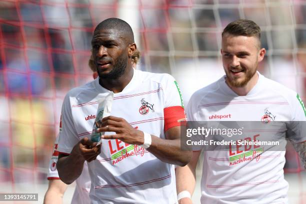 Anthony Modeste of 1.FC Koeln celebrates his team's second goal with teammate Florian Kainz during the Bundesliga match between 1. FC Köln and DSC...