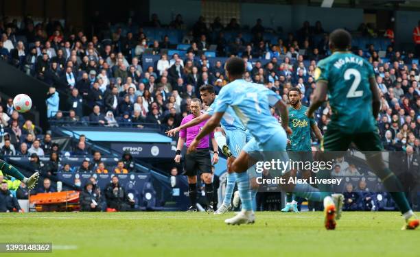 Rodrigo of Manchester City scores their team's third goal during the Premier League match between Manchester City and Watford at Etihad Stadium on...