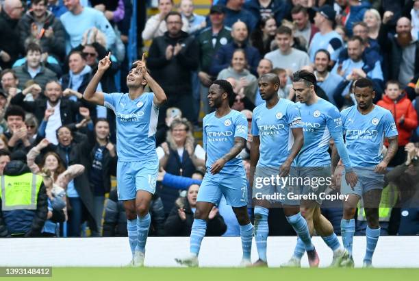 Rodrigo of Manchester City celebrates with teammates after scoring their team's third goal during the Premier League match between Manchester City...