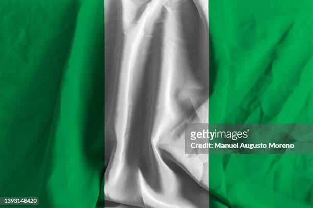 flag of nigeria - nigerian flag stock pictures, royalty-free photos & images