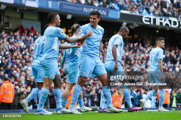 Rodri of Manchester City celebrates after scoring his side's third goal during the Premier League match between Manchester City and Watford at Etihad...