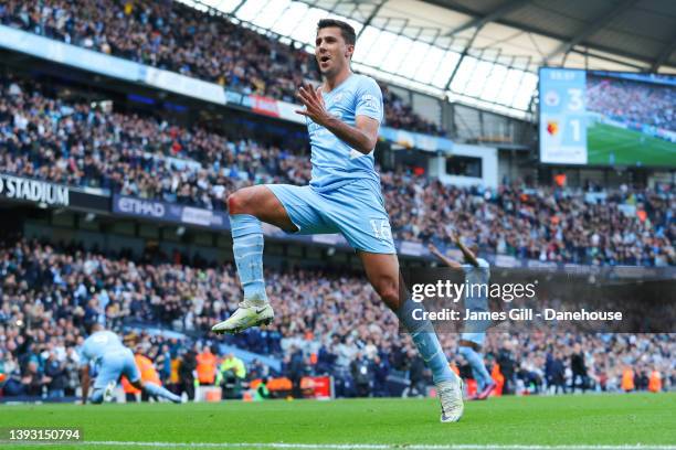 Rodri of Manchester City celebrates after scoring his side's third goal during the Premier League match between Manchester City and Watford at Etihad...