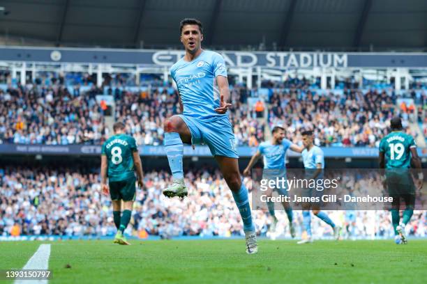 Rodri of Manchester City celebrates after scoring his side's third goal during the Premier League match between Manchester City and Watford at Etihad...