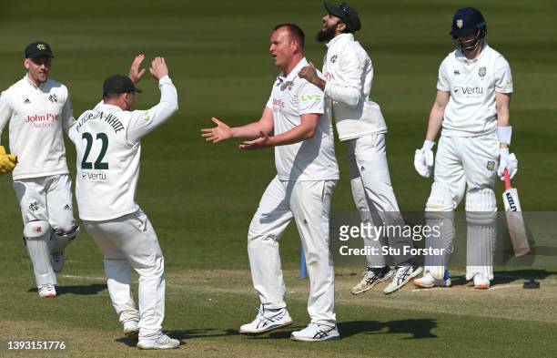 Notts bowler Luke Fletcher is congratulated by Haseeb Hameed after taking the wicket of Michael Jones during day three of the LV= Insurance County...