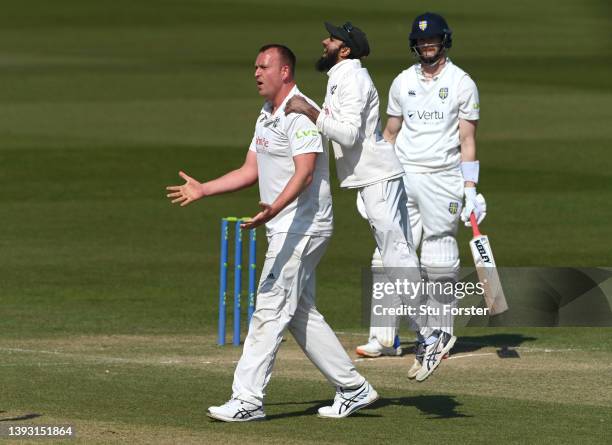 Notts bowler Luke Fletcher is congratulated by Haseeb Hameed after taking the wicket of Michael Jones during day three of the LV= Insurance County...