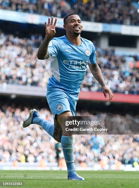 Gabriel Jesus of Manchester City celebrates after scoring their side's fifth goal from a penalty during the Premier League match between Manchester...