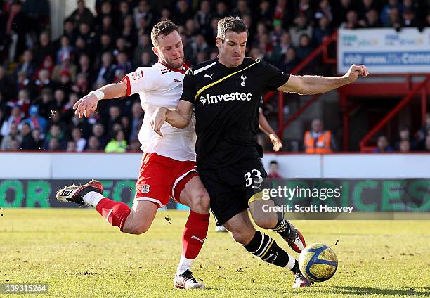 Ryan Nelsen of Tottenham clears the ball from Chris Beardsley of Stevenage during the FA Cup Fifth Round match between Stevenage and Tottenham...