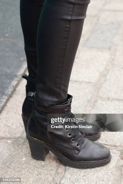 Sara Stokes wearing Black lace ups boots, street style at London fashion week autumn/winter 2012 womenswear shows on February 18, 2012 in London,...