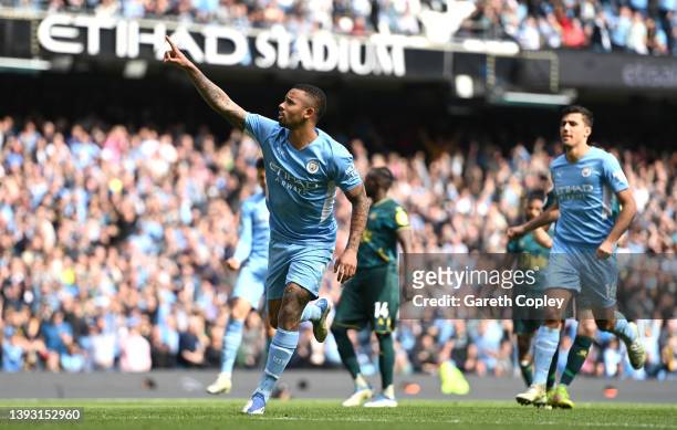 Gabriel Jesus of Manchester City celebrates after scoring their team's fourth goal during the Premier League match between Manchester City and...