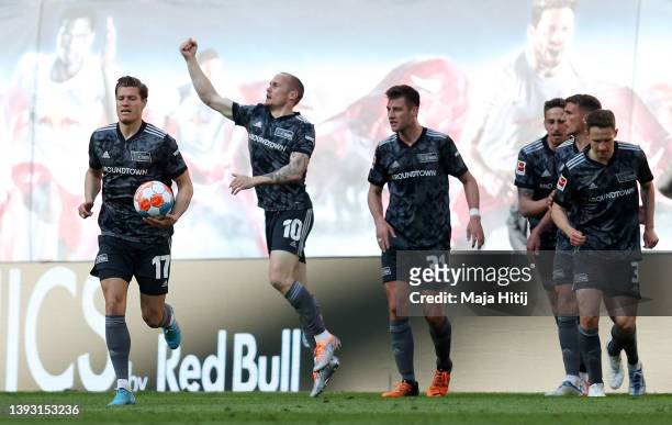 Sven Michel of 1.FC Union Berlin celebrates after scoring their side's first goal during the Bundesliga match between RB Leipzig and 1. FC Union...