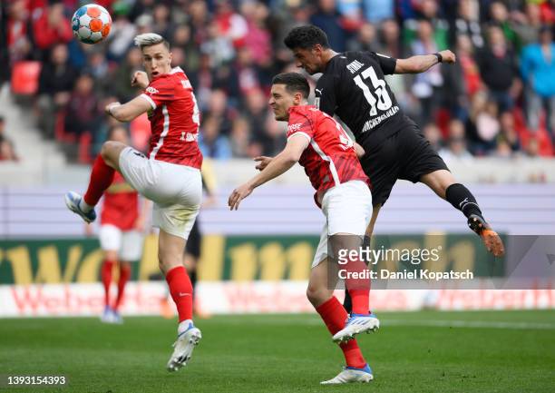 Lars Stindl of Borussia Monchengladbach scores their side's third goal during the Bundesliga match between Sport-Club Freiburg and Borussia...