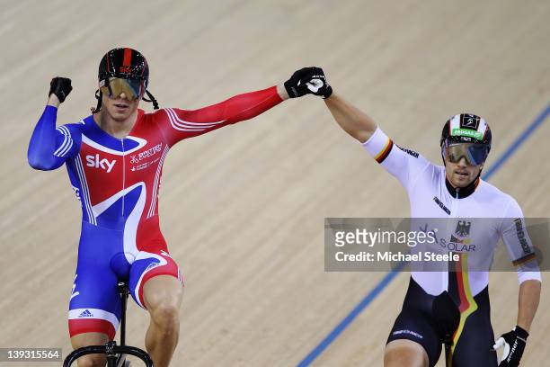 Race winner Sir Chris Hoy of Great Britain celebrates with second placed Maximilian Levy of Germany after competing in the Men's Sprint Finals during...