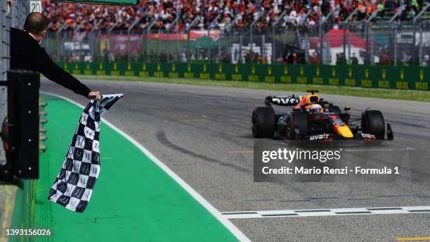 Sprint winner Max Verstappen of the Netherlands driving the Oracle Red Bull Racing RB18 takes the chequered flag during Sprint ahead of the F1 Grand...